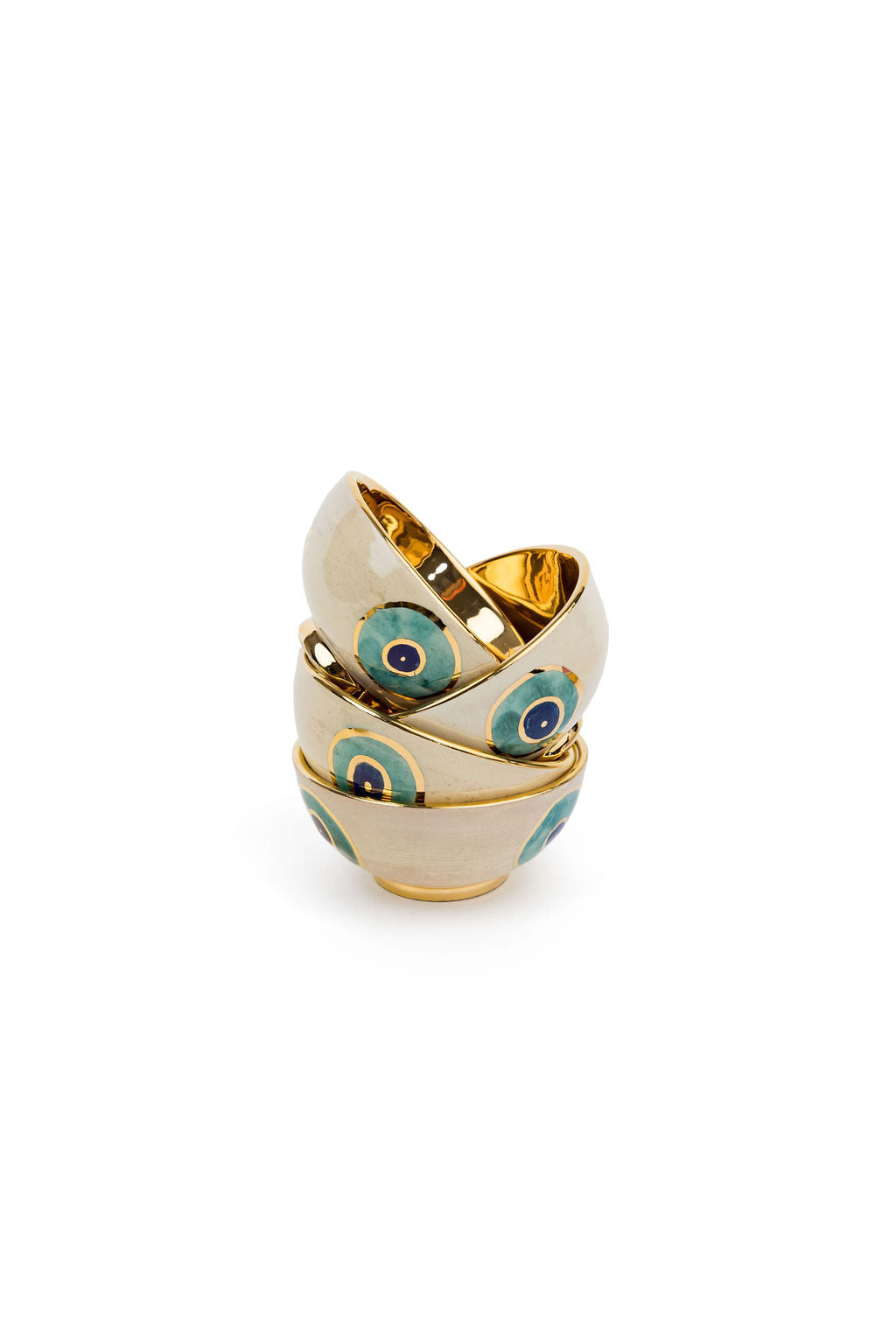 small beige and gold evil eye bowl