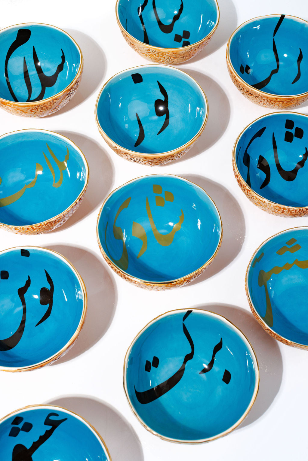 Blue And Beige Bowls With Farsi Writing