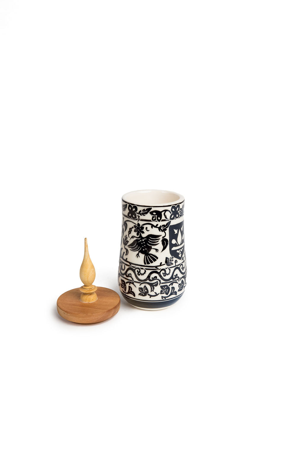 Moroccan handmade black and white ceramic canister.
